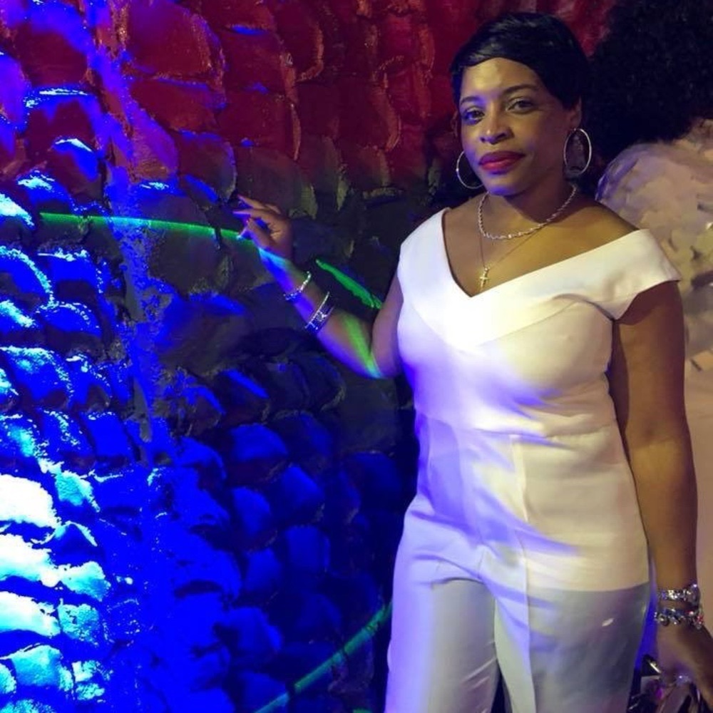 All white light weight jumpsuit.